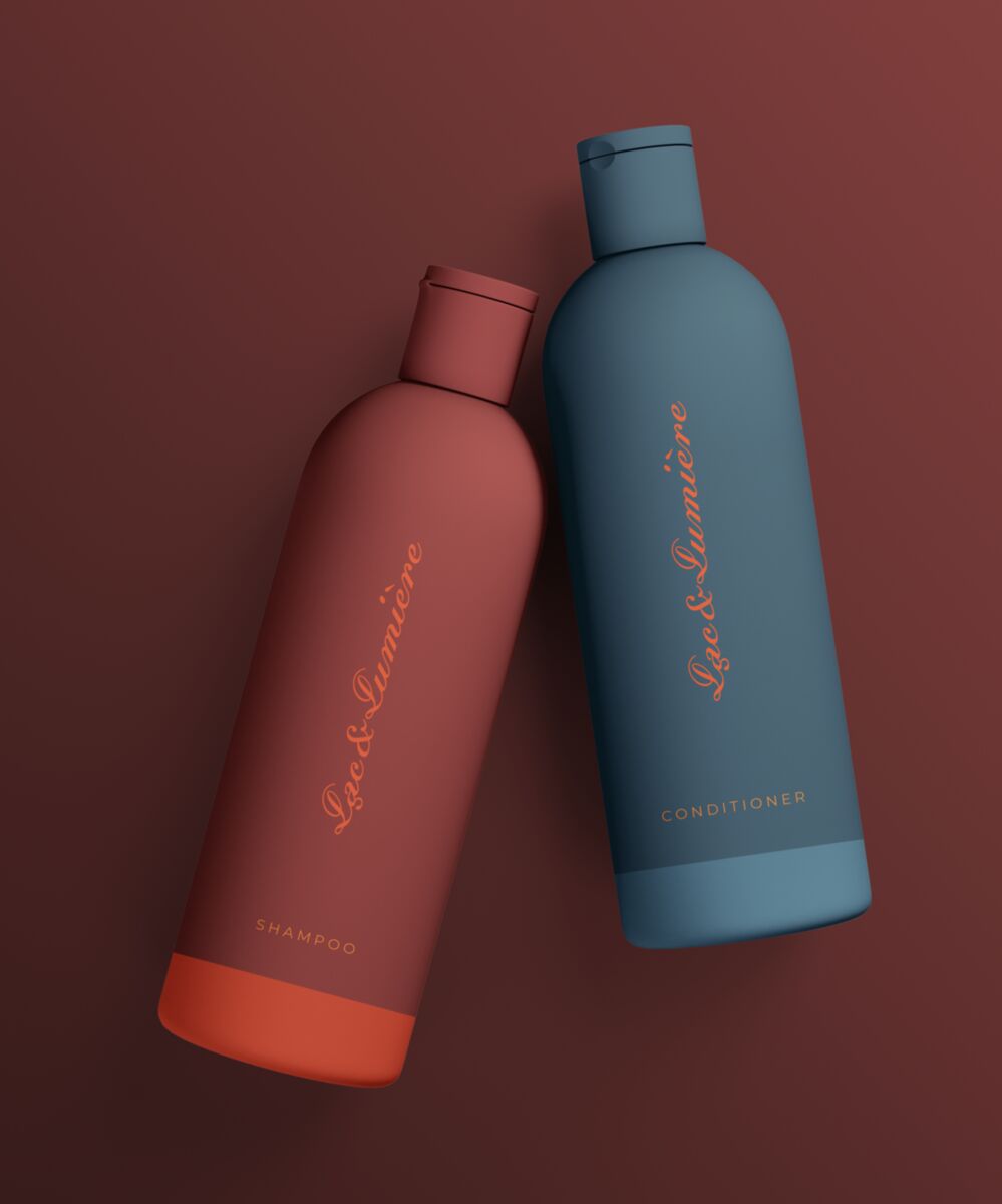 Red and blue Lac & Lumière amenity bottles